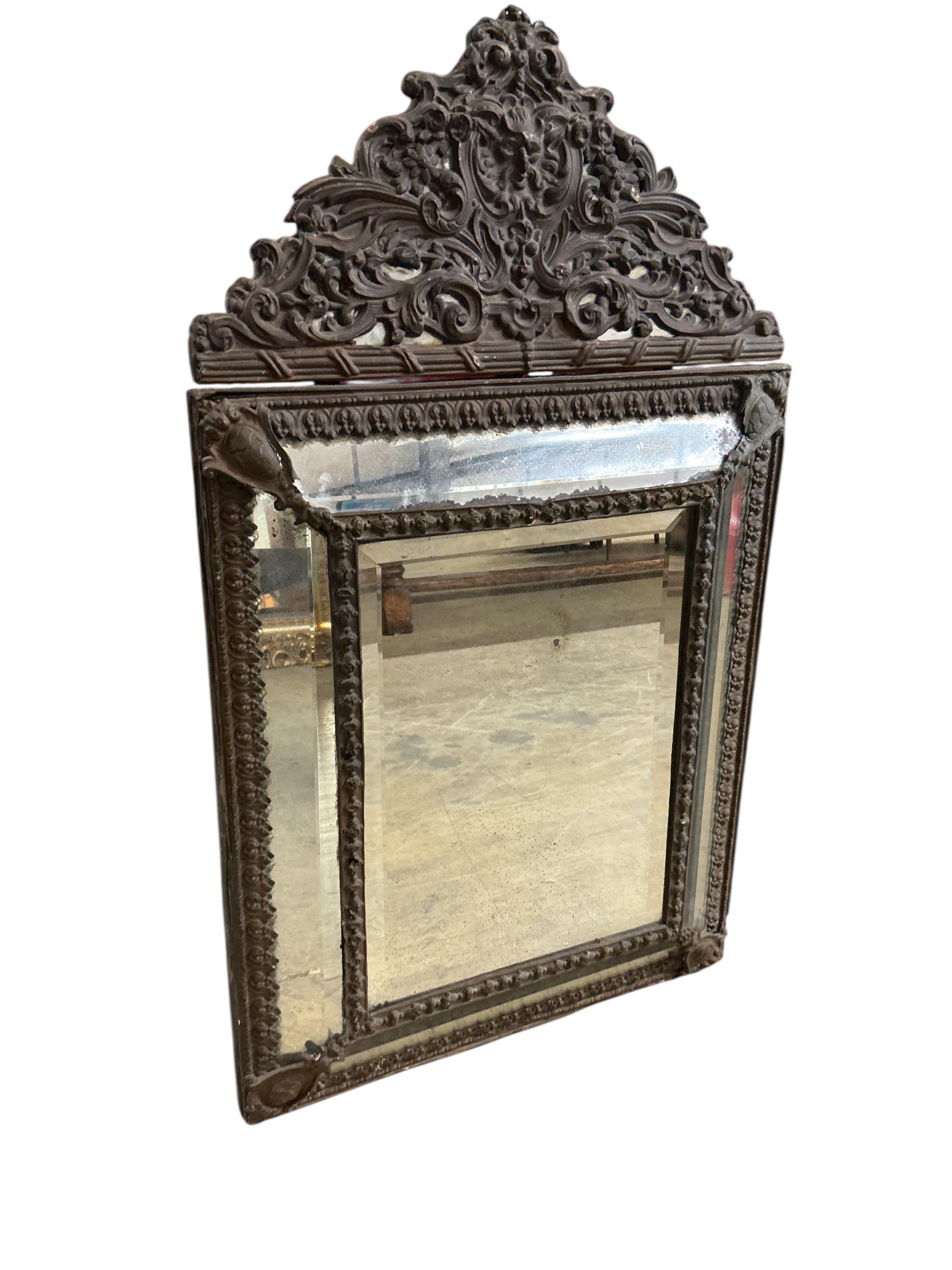 A 19th century French embossed brass wall mirror, width 59cm, height 102cm
